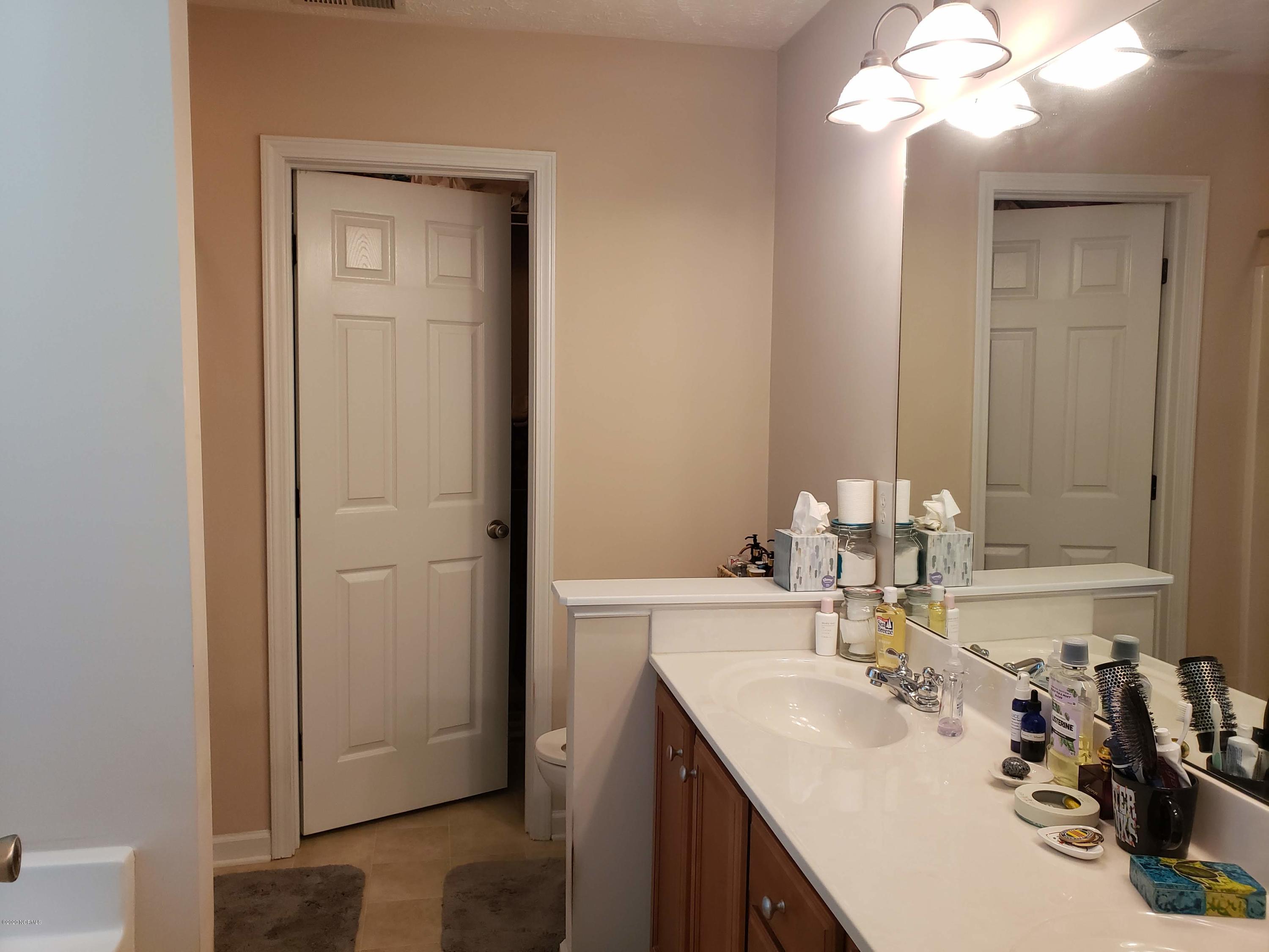 116 Overton Road Raeford, NC 28376 - Photo 9 of 14 Owner's Bath with double vanity and walkin closet
