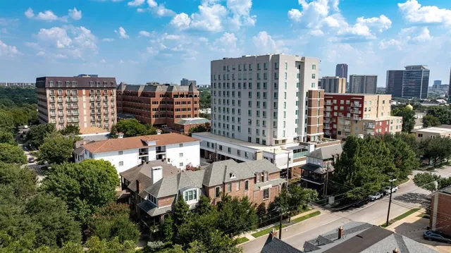 a view of a city with tall buildings