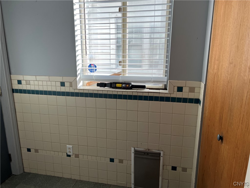 100 Hampton Road Syracuse, NY 13203 - Photo 21 of 46 off kitchen entry with dog door to kennel