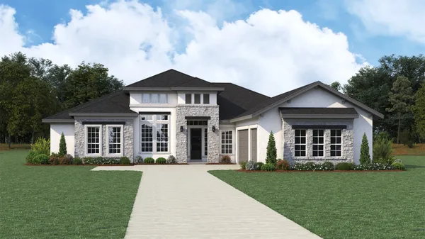 front view of a house with a yard