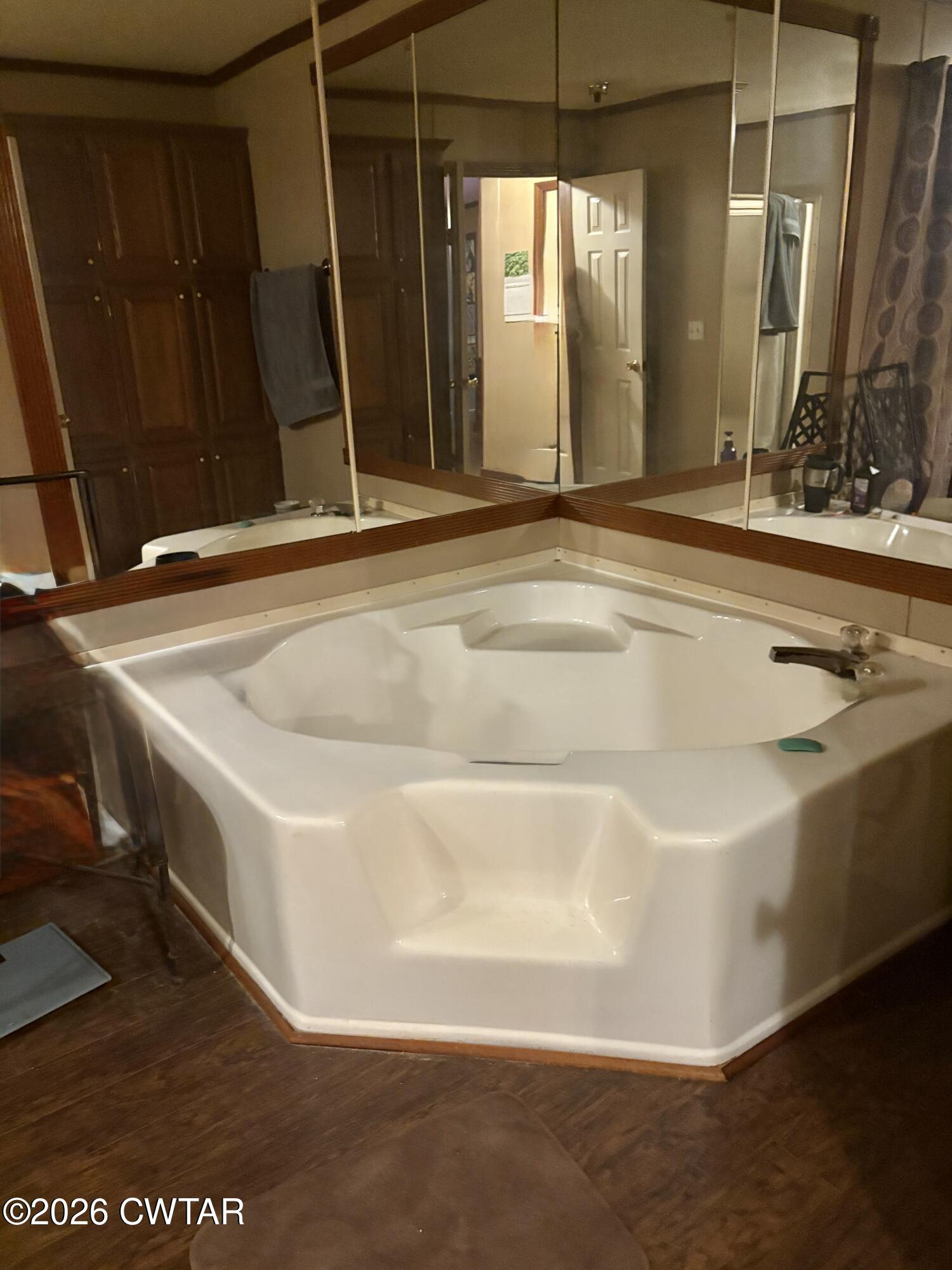 3834 Union Mercer Road Brownsville, TN 38012 - Photo 7 of 15 a view of a bathroom with tub and sink