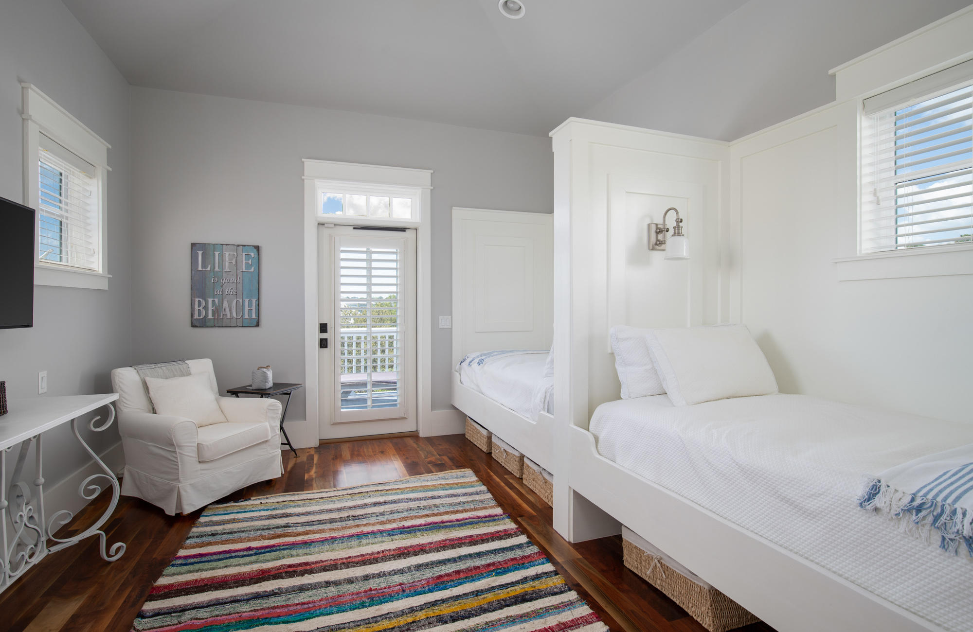 41 Beachcomber Lane Inlet Beach, FL 32461 - Photo 15 of 35 a spacious bedroom with a bed and a couch