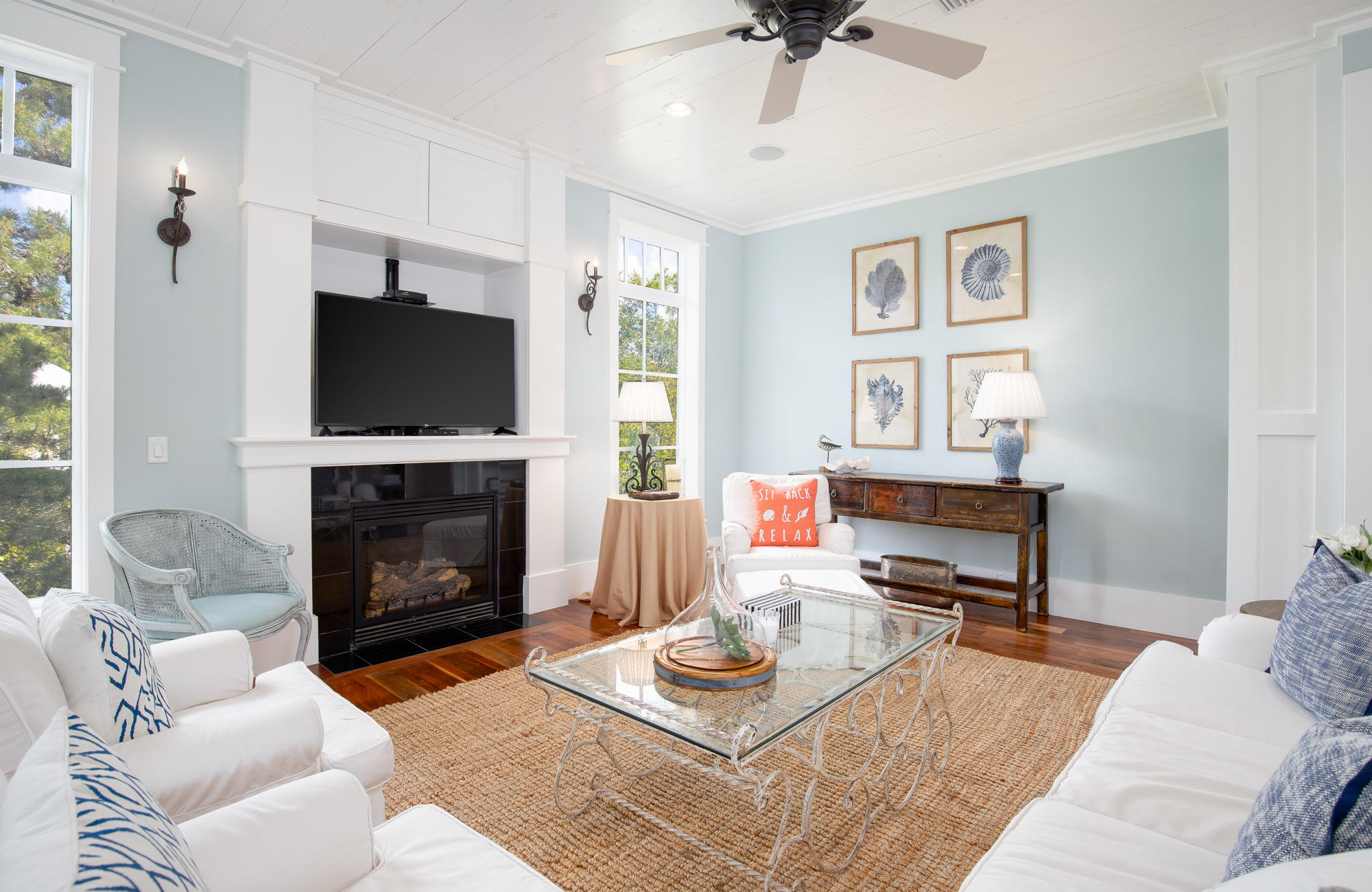 41 Beachcomber Lane Inlet Beach, FL 32461 - Photo 4 of 35 a living room with furniture a fireplace and a flat screen tv