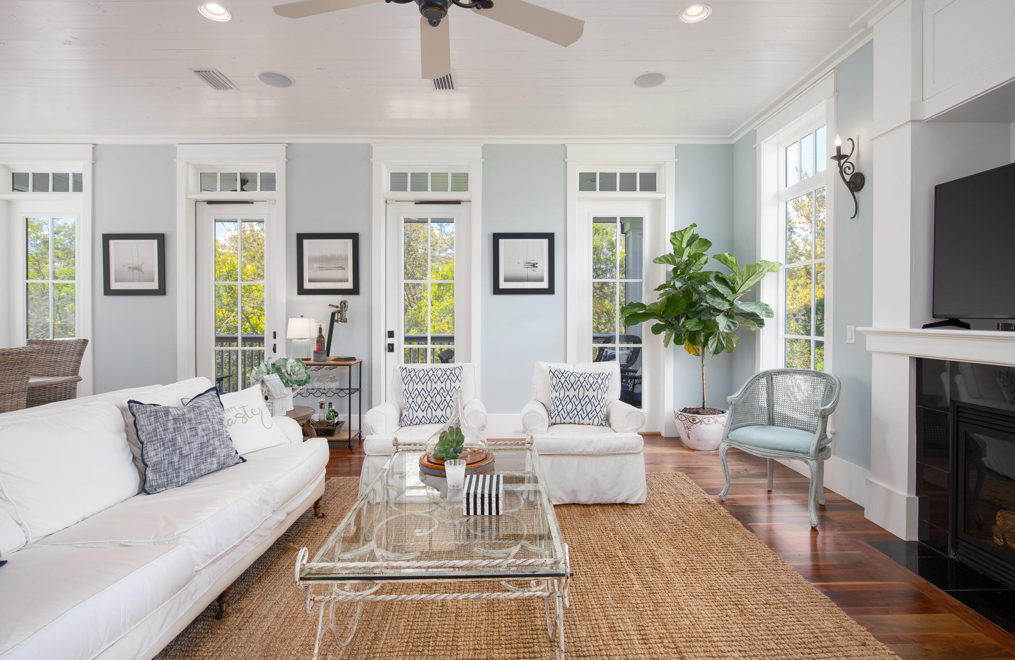 41 Beachcomber Lane Inlet Beach, FL 32461 - Photo 5 of 35 a living room with fireplace furniture and a flat screen tv