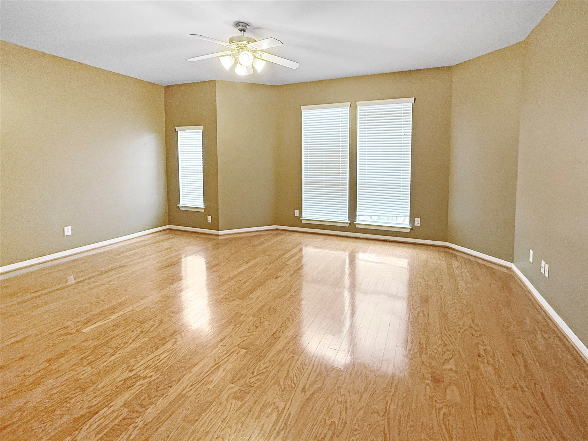 1263 West 17th Street Houston, TX 77008 - Photo 7 of 17 a view of an empty room with wooden floor and a window