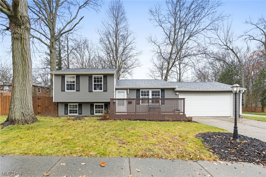 4251 Kenneth Road Stow, OH 44224 - Photo 1 of 19 Split level home featuring a front lawn, a deck, and a garage