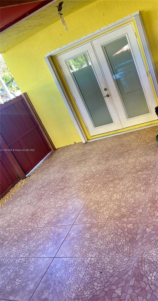 19550 Southwest 103rd Court, Unit 5 Cutler Bay, FL 33157 - Photo 19 of 28 a view of an empty room