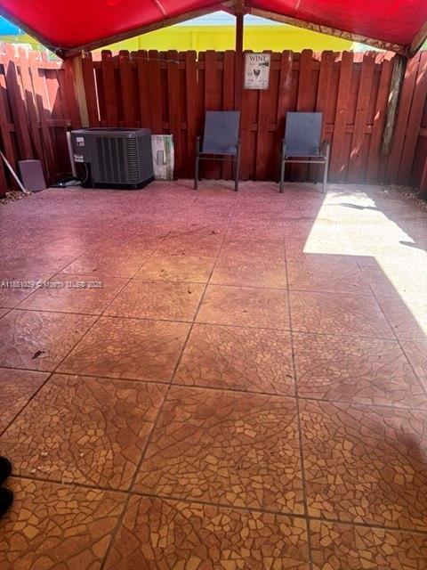 19550 Southwest 103rd Court, Unit 5 Cutler Bay, FL 33157 - Photo 21 of 28 a view of a backyard