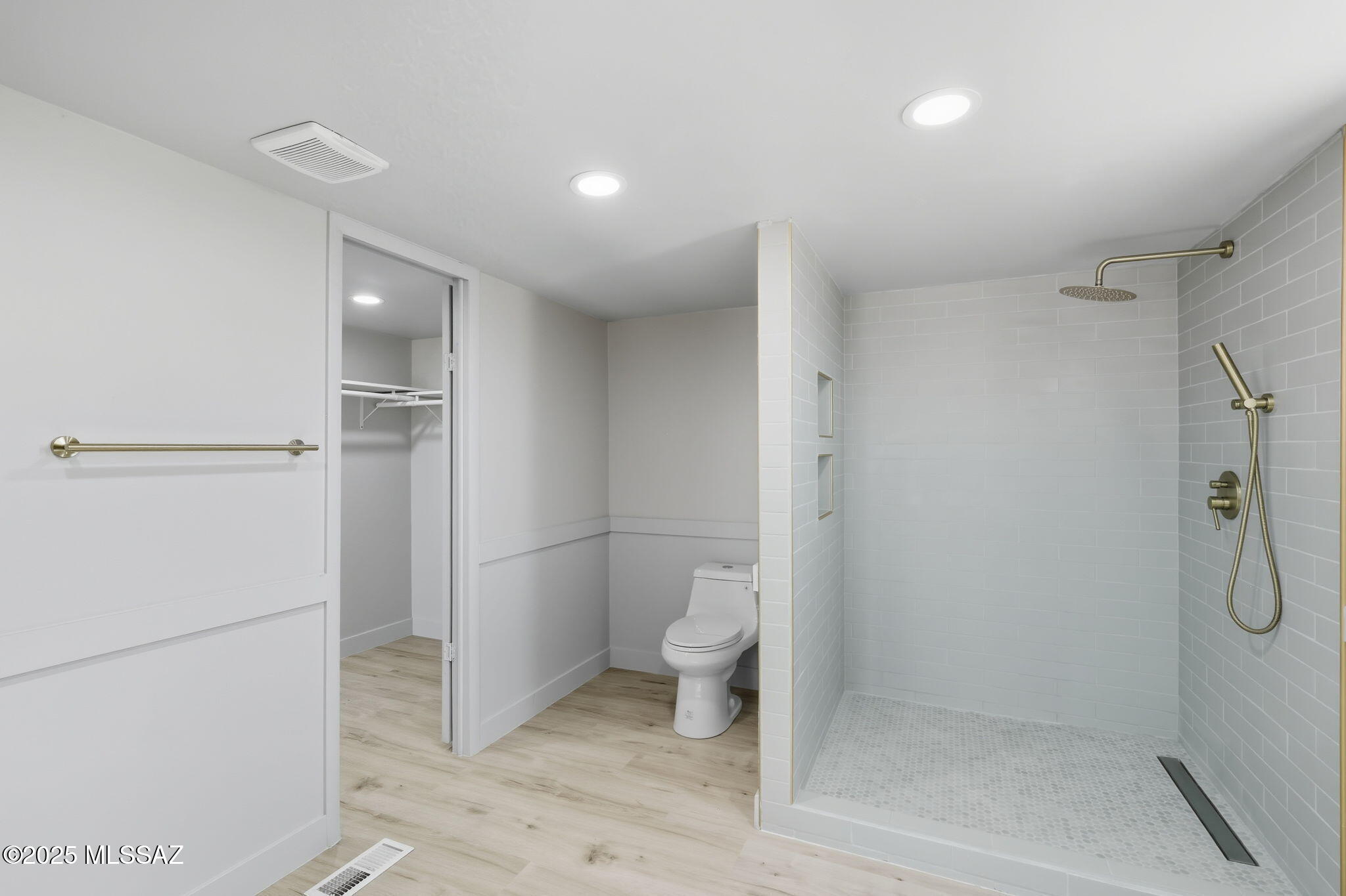 8790 North Trico Road Marana, AZ 85653 - Photo 16 of 35 a bathroom with a shower and toilet