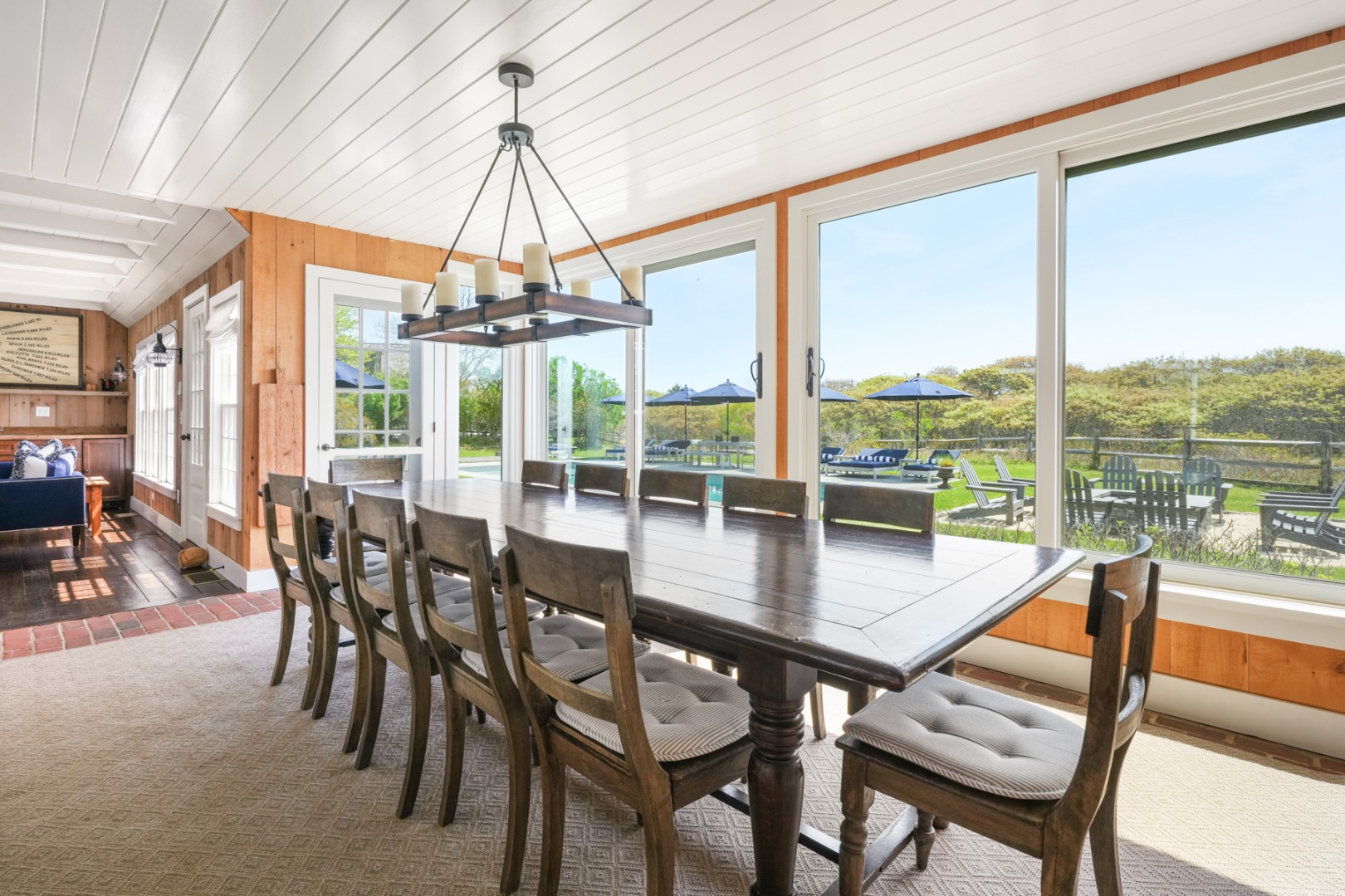 21 Quidnet Road Nantucket, MA 02554 - Photo 9 of 62 a view of a dining room with furniture window and outside view