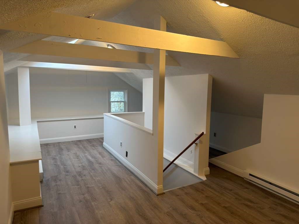 37 Exchange Street, Unit 37 Millis, MA 02054 - Photo 13 of 15 a view of a hallway with staircase