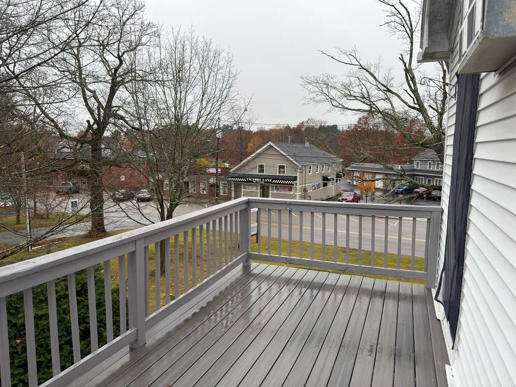 37 Exchange Street, Unit 37 Millis, MA 02054 - Photo 14 of 15 a view of balcony with a deck