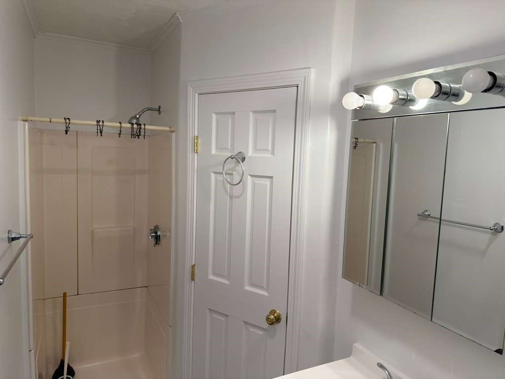 37 Exchange Street, Unit 37 Millis, MA 02054 - Photo 9 of 15 a bathroom with a shower