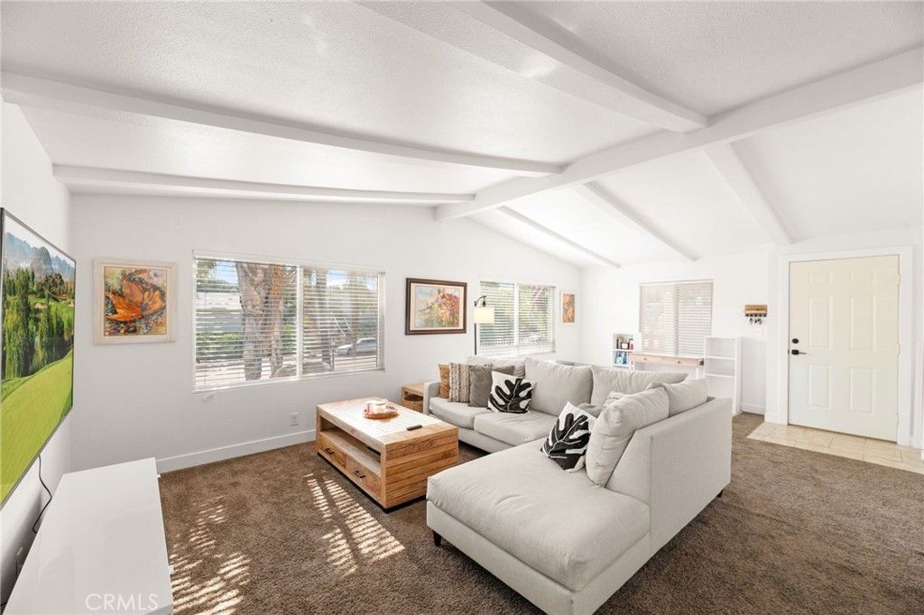 33653 Windmill Road Wildomar, CA 92595 - Photo 21 of 66 a living room with furniture and a large window