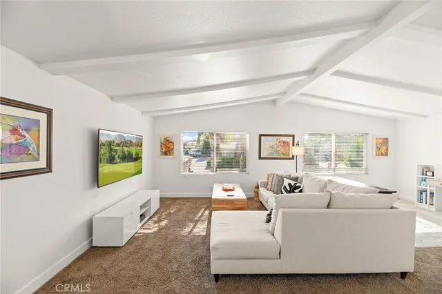 a large kitchen with stainless steel appliances lots of counter top space