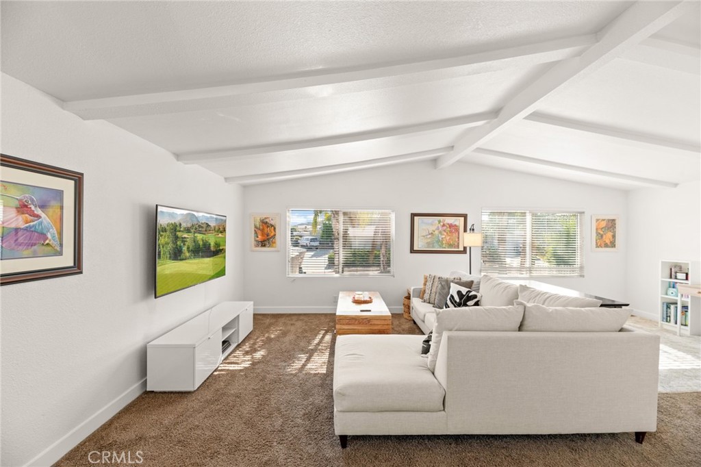 33653 Windmill Road Wildomar, CA 92595 - Photo 22 of 66 a living room with furniture and window