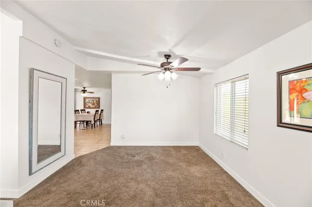 a kitchen with stainless steel appliances granite countertop a refrigerator sink and stove