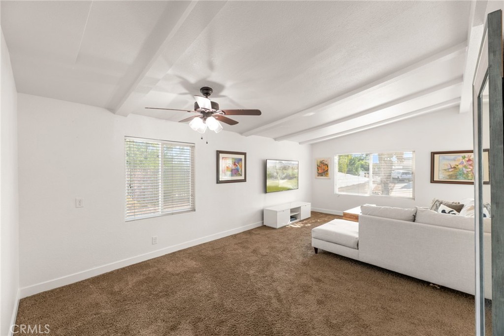 33653 Windmill Road Wildomar, CA 92595 - Photo 24 of 66 a living room with furniture and a window