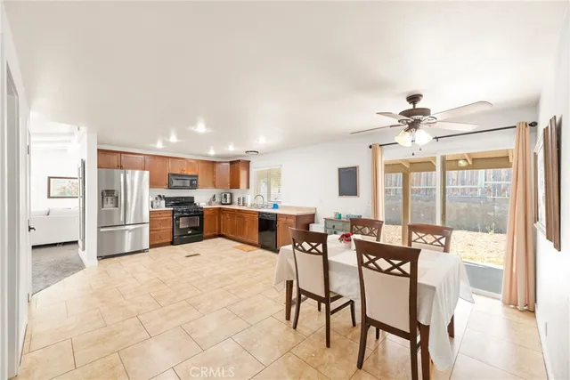 a bedroom with a bed and a lamp on table