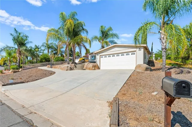 a view of a backyard with a patio