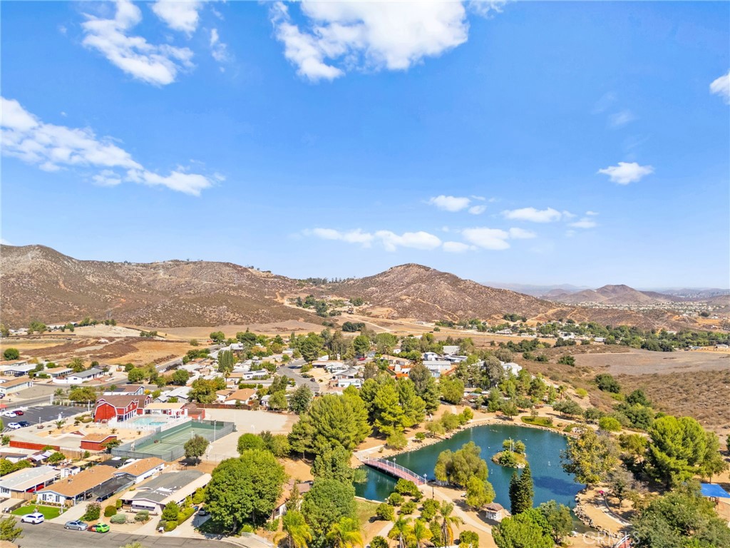 33653 Windmill Road Wildomar, CA 92595 - Photo 63 of 66 an aerial view of residential houses with outdoor space and trees