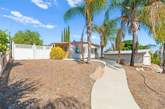 a view of outdoor space with palm trees
