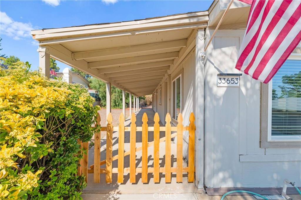 33653 Windmill Road Wildomar, CA 92595 - Photo 10 of 66 a front view of a house with a garage