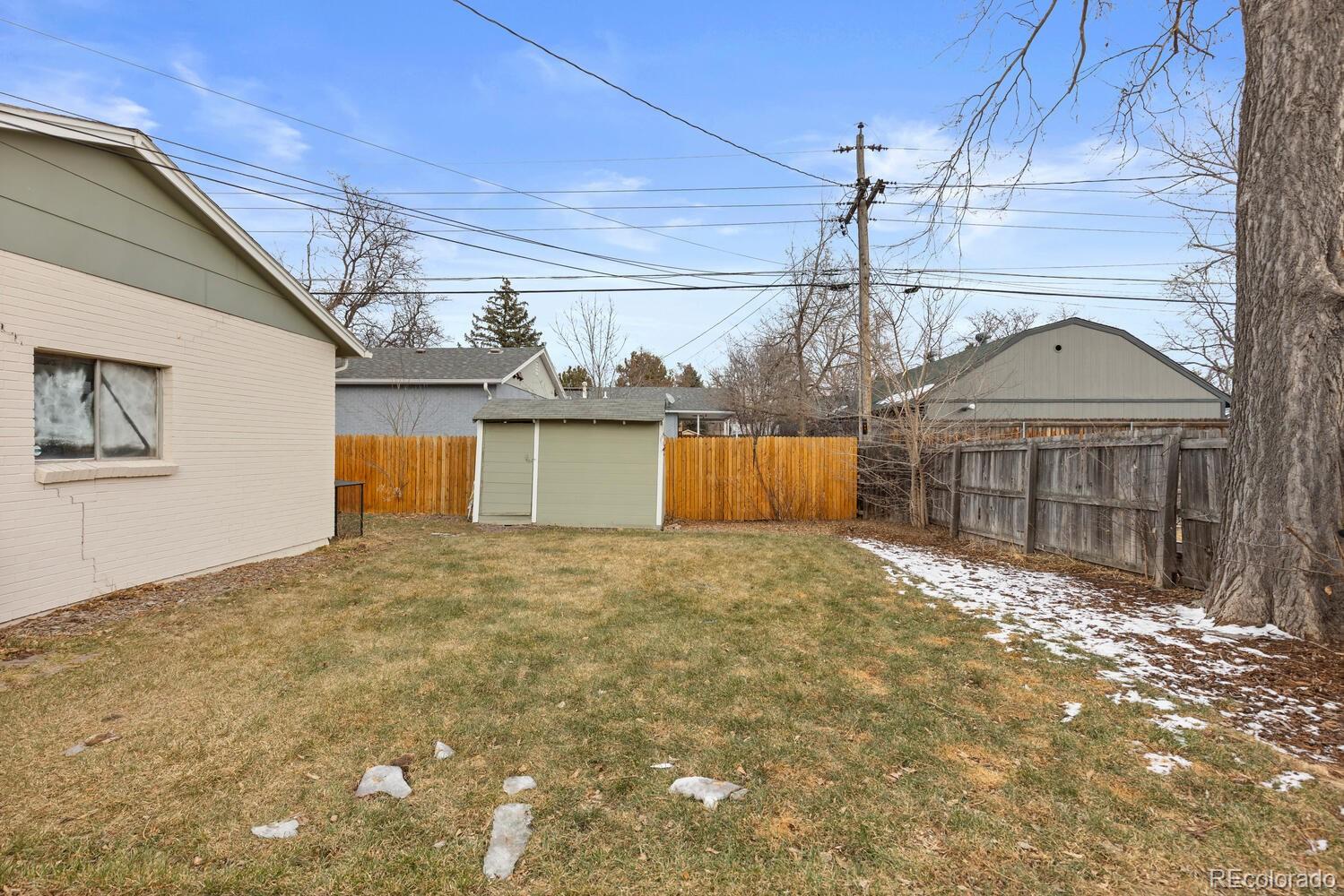 3106 South Wolff Street Denver, CO 80236 - Photo 43 of 48 a view of a indoor garage
