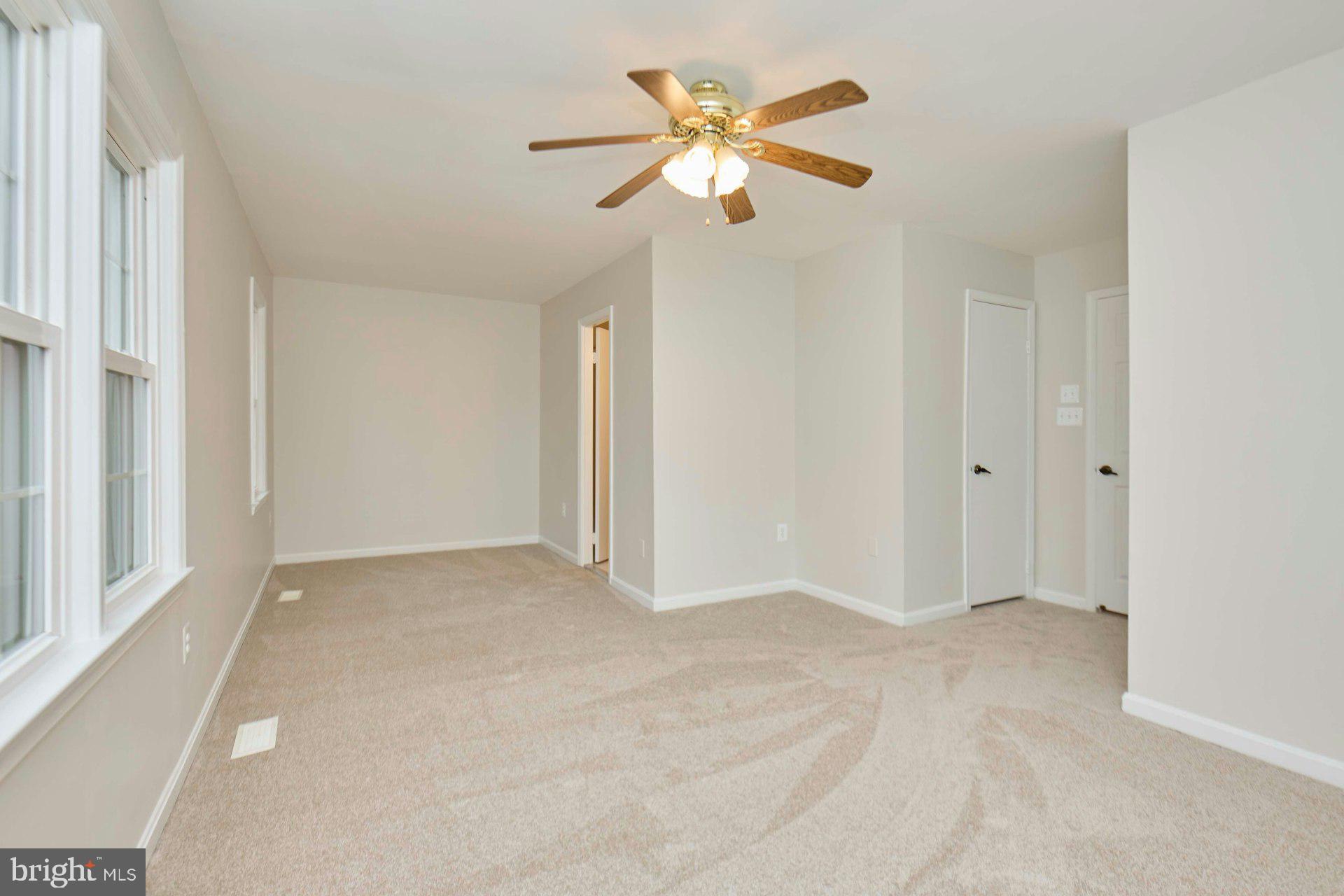 9007 O'Keith Court Springfield, VA 22152 - Photo 13 of 39 a view of an empty room with a window