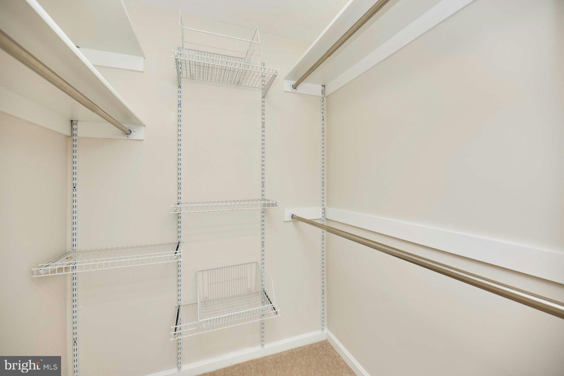 9007 O'Keith Court Springfield, VA 22152 - Photo 18 of 39 a bathroom with a glass shower door