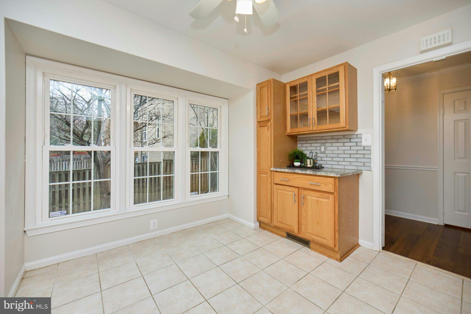 9007 O'Keith Court Springfield, VA 22152 - Photo 6 of 39 a view of an empty room with a window