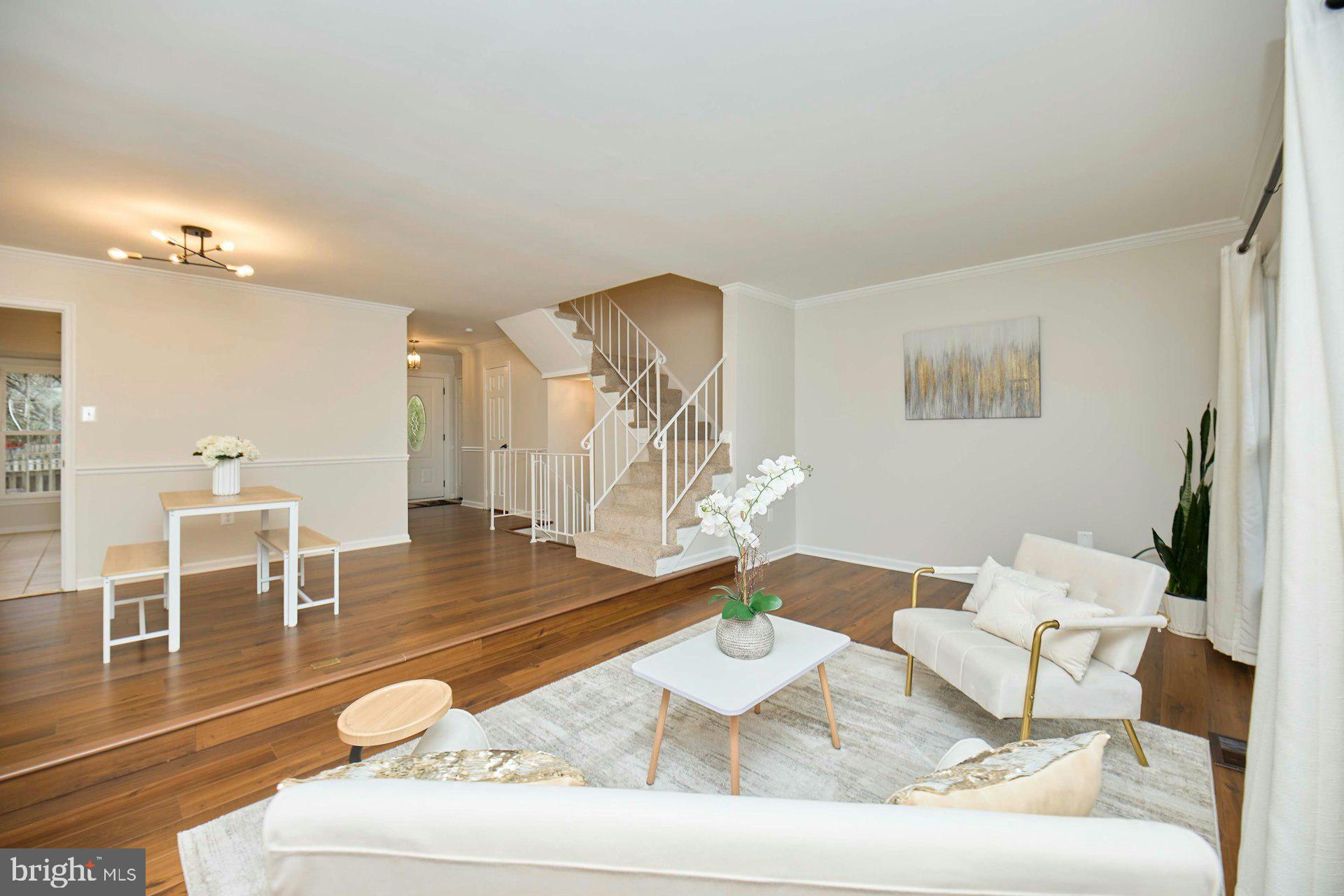 9007 O'Keith Court Springfield, VA 22152 - Photo 7 of 39 a living room with furniture and wooden floor