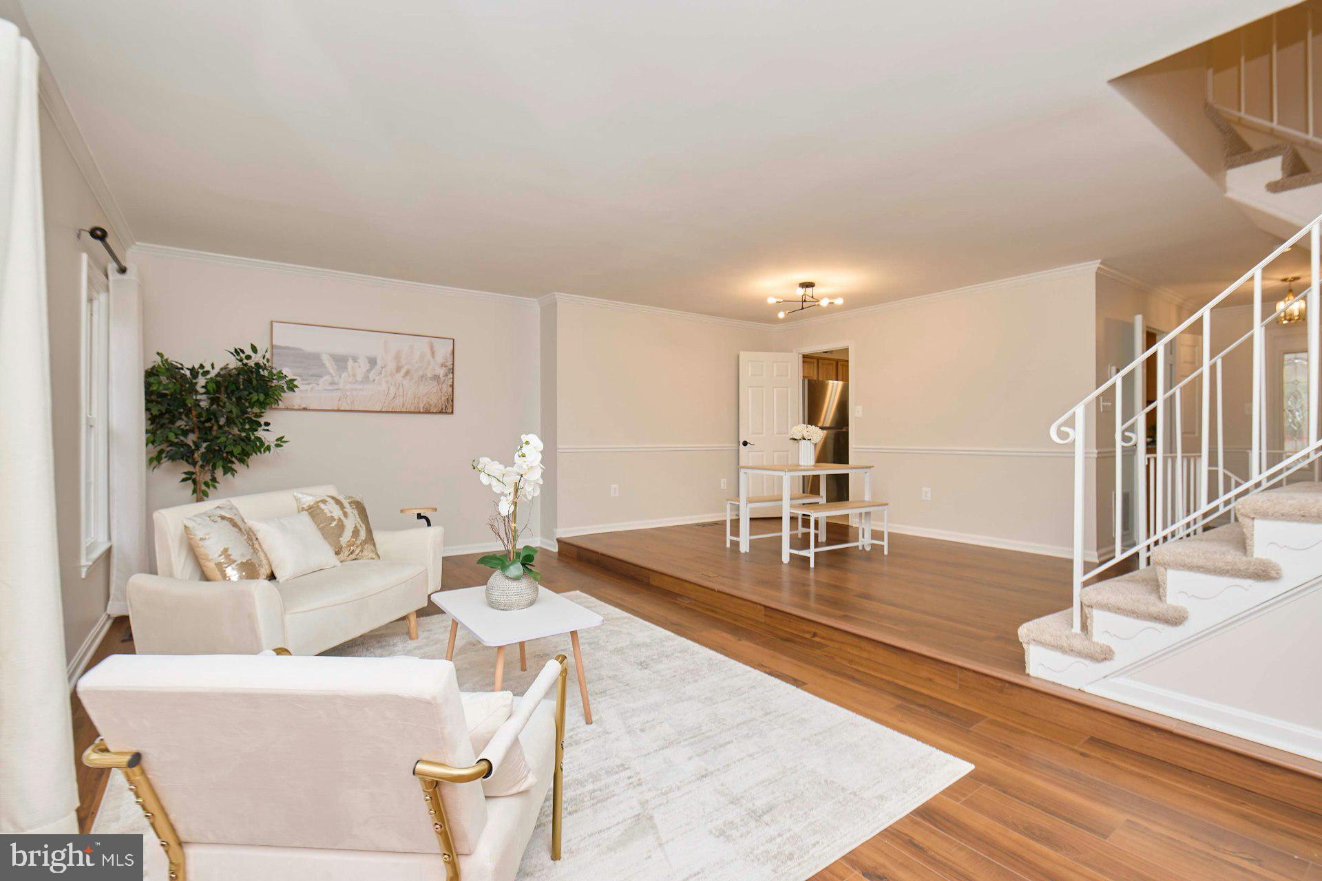 9007 O'Keith Court Springfield, VA 22152 - Photo 8 of 39 a living room with furniture and wooden floor