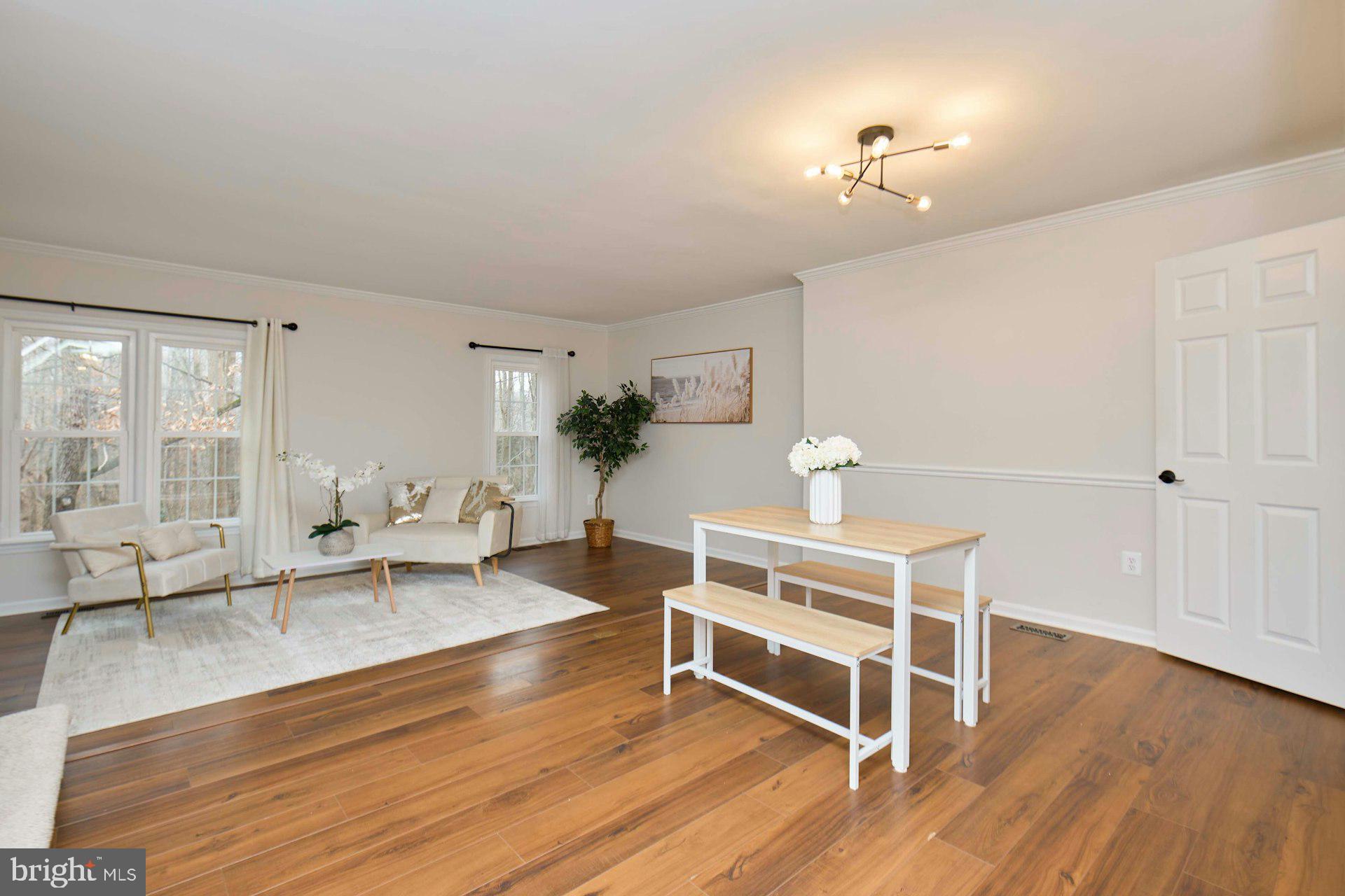 9007 O'Keith Court Springfield, VA 22152 - Photo 10 of 39 a living room with furniture and wooden floor
