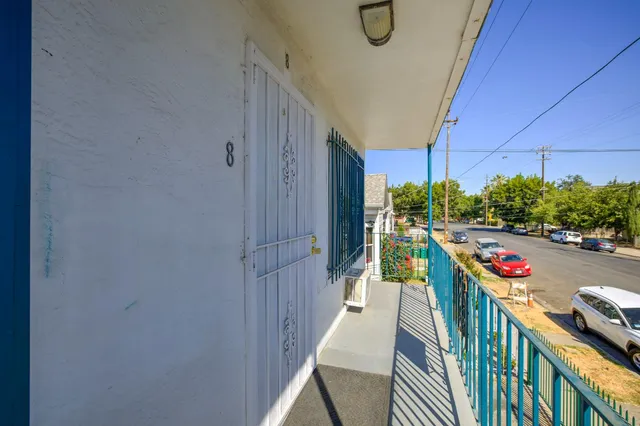 an empty room with a kitchen