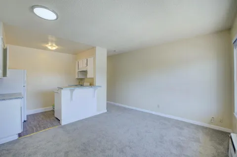 a view of a kitchen with a sink