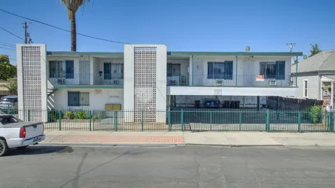 a view of balcony with wooden floor