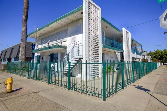 a view of a brick wall of a building