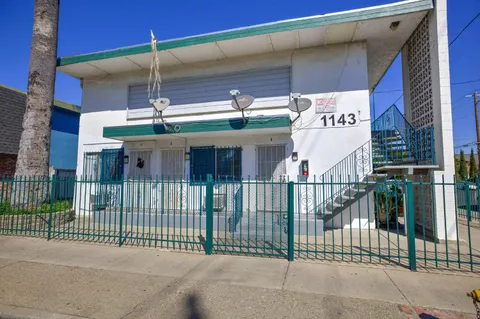 a view of a brick building and a window