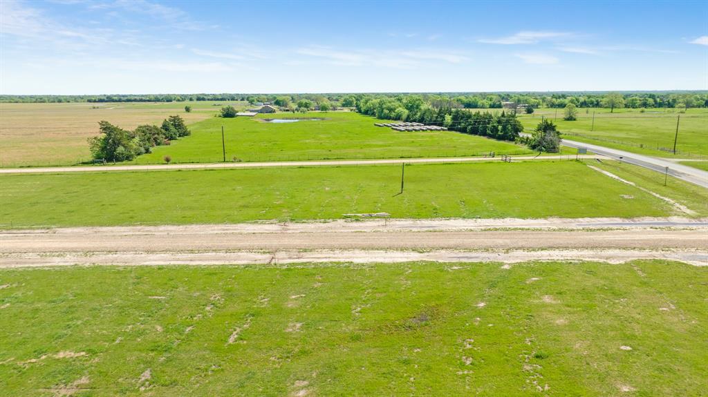 174 Private Road Sumner, TX 75486 - Photo 12 of 12 a view of a swimming pool and lake