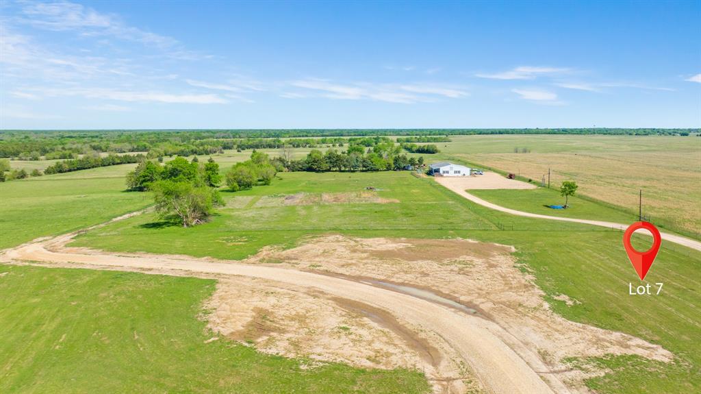 174 Private Road Sumner, TX 75486 - Photo 3 of 12 a view of a lake with a big yard