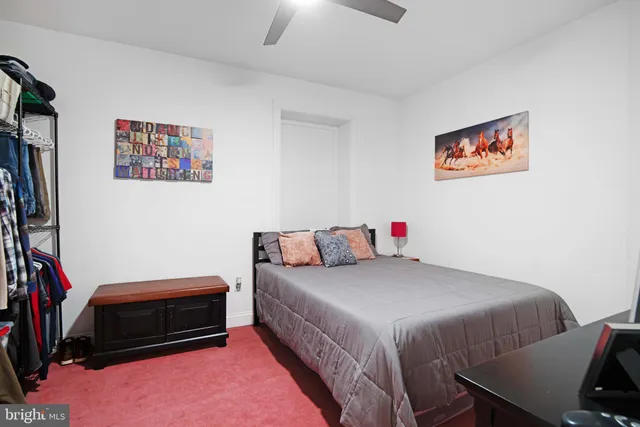 a view of a hallway with staircase