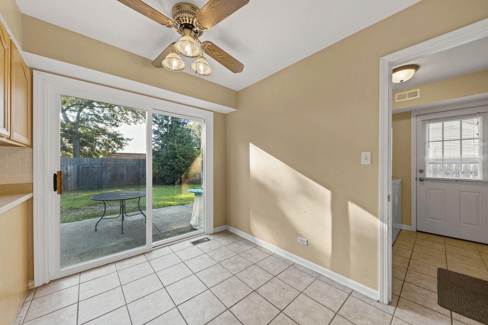 1121 Belmar Lane Buffalo Grove, IL 60089 - Photo 14 of 22 a view of an entryway with a floor to ceiling window