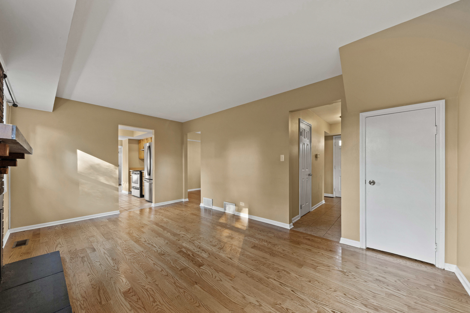 1121 Belmar Lane Buffalo Grove, IL 60089 - Photo 10 of 22 wooden floor in an empty room