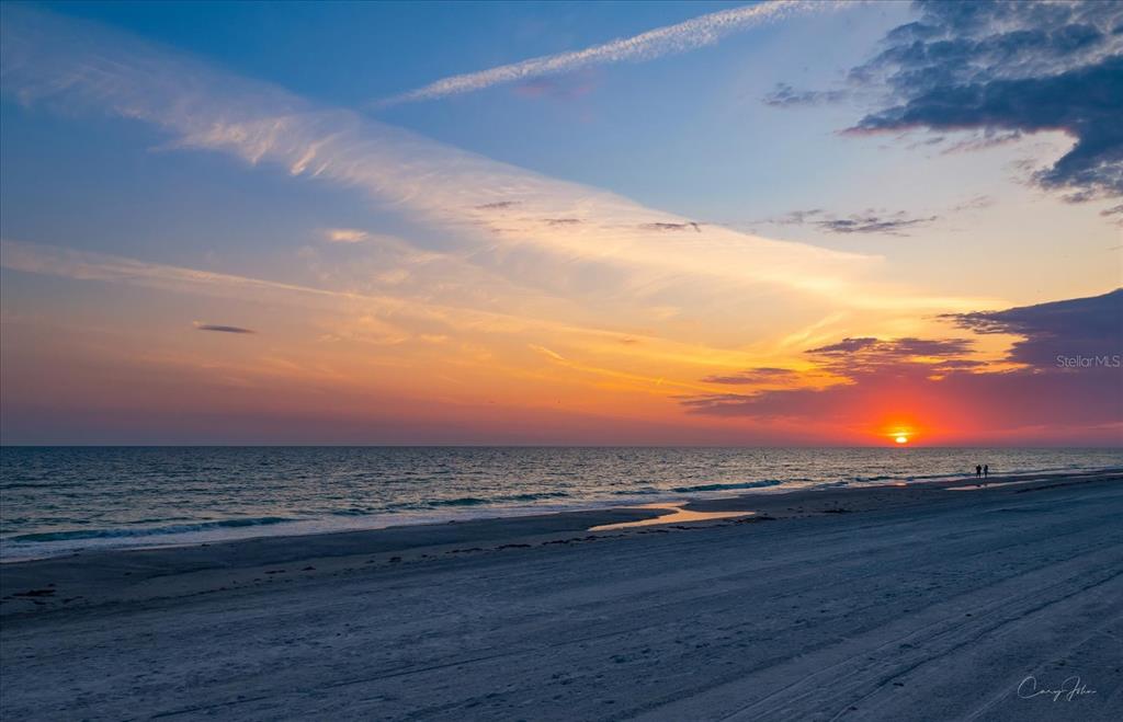127 11th Avenue Indian Rocks Beach, FL 33785 - Photo 39 of 63 a view of an ocean beach and mountain