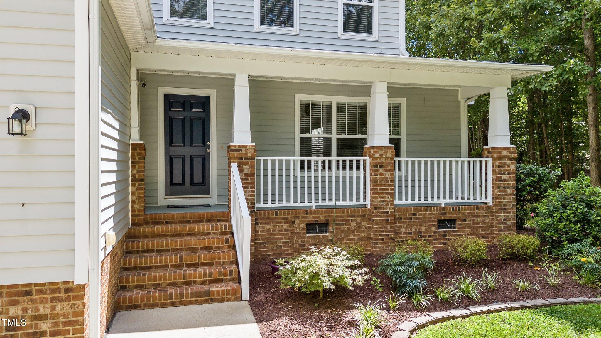 2713 Rustic Brick Road Raleigh, NC 27603 - Photo 5 of 53 front view of a house with a yard