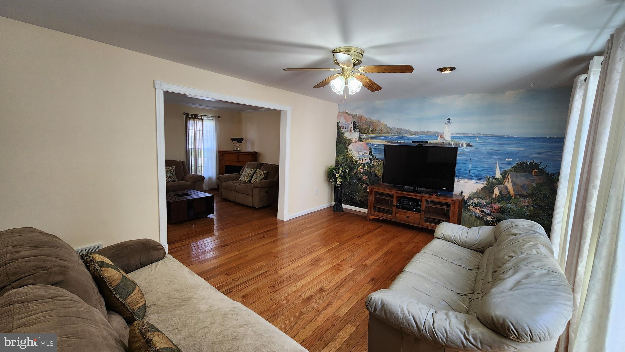 46 Currant Drive Newark, DE 19702 - Photo 14 of 47 a living room with furniture and a flat screen tv