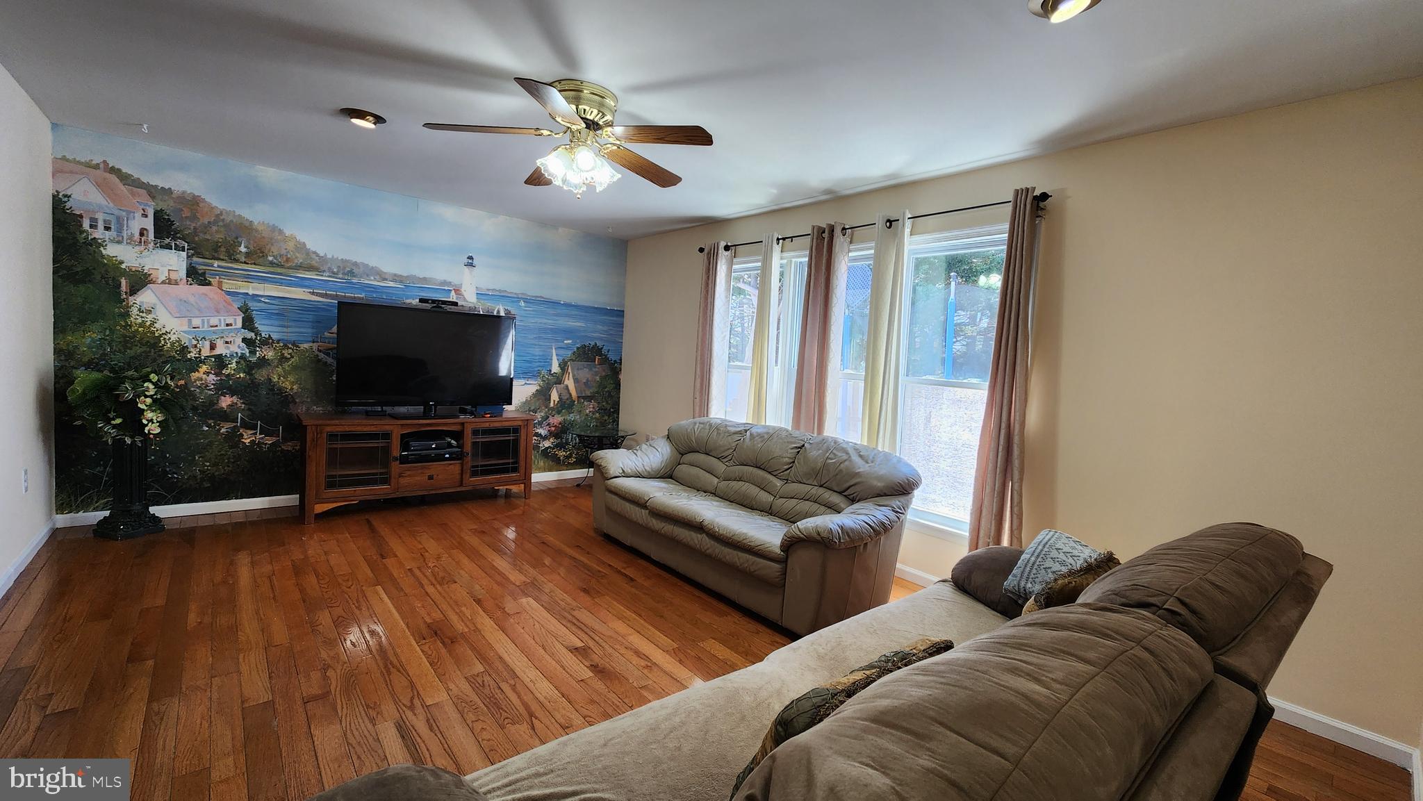 46 Currant Drive Newark, DE 19702 - Photo 15 of 47 a living room with furniture and a flat screen tv