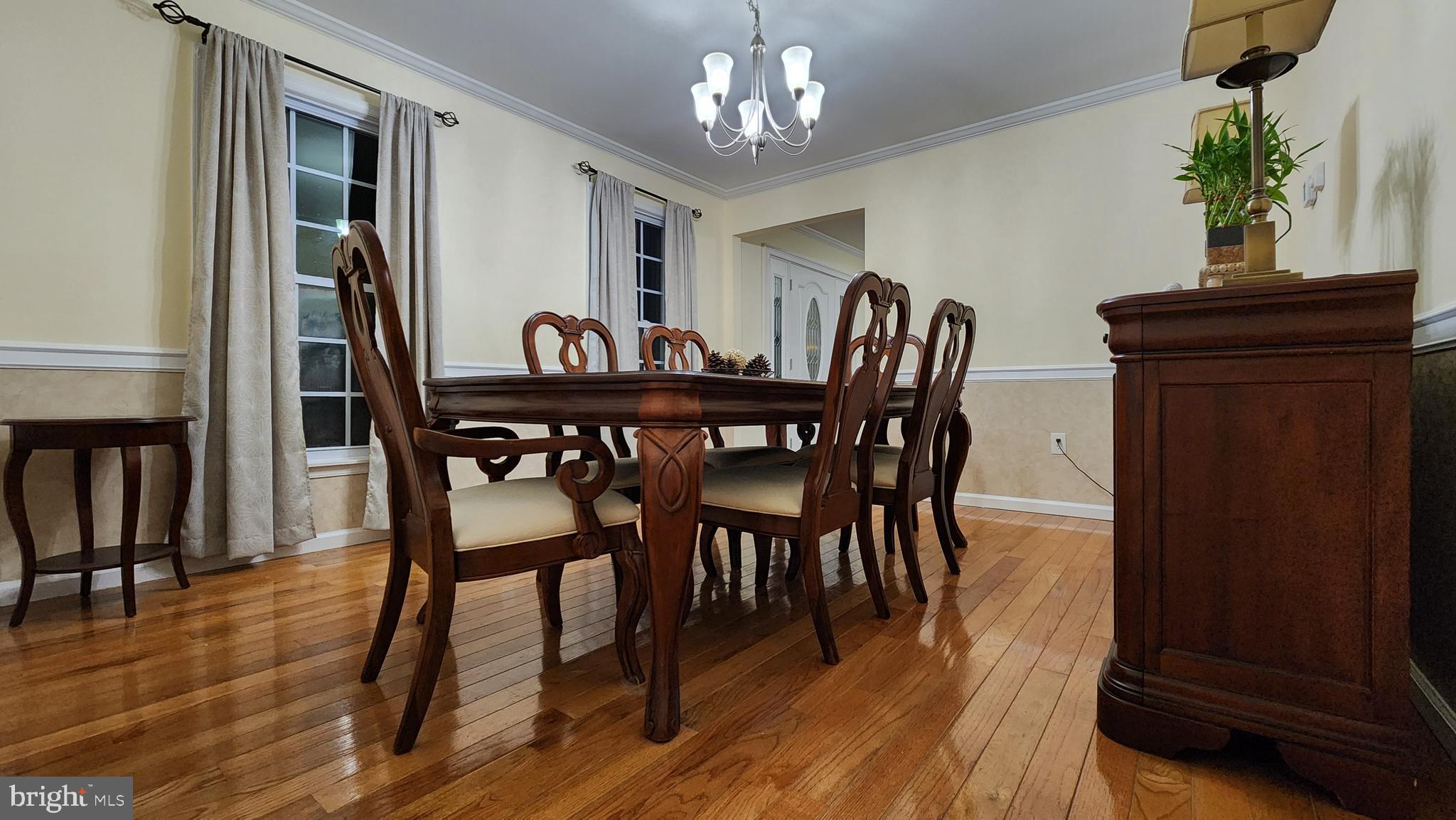 46 Currant Drive Newark, DE 19702 - Photo 16 of 47 a view of a dining room with furniture and wooden floor
