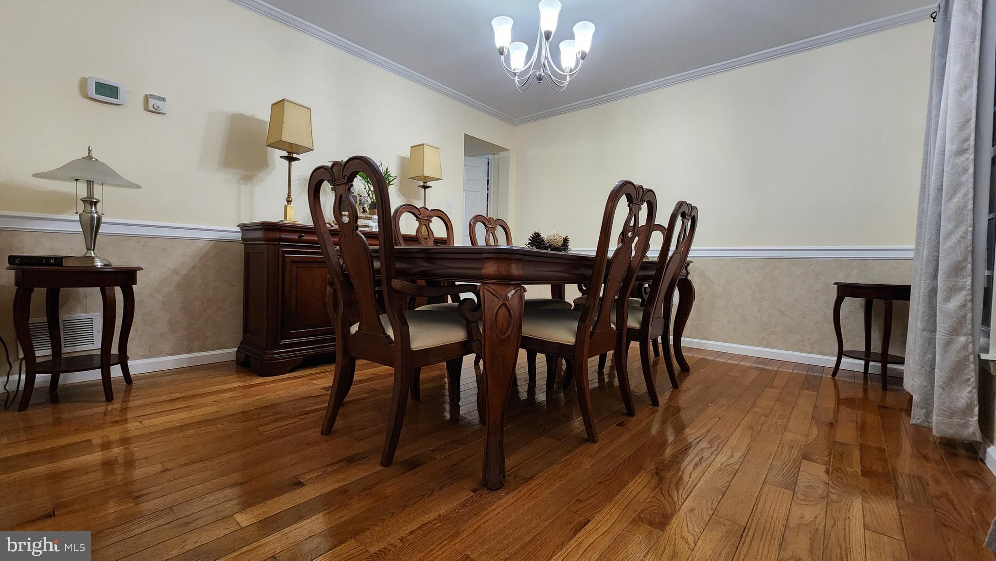 46 Currant Drive Newark, DE 19702 - Photo 17 of 47 a view of a dining room with furniture and wooden floor
